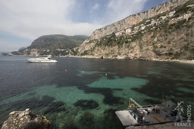 Yacht and cleaning boat