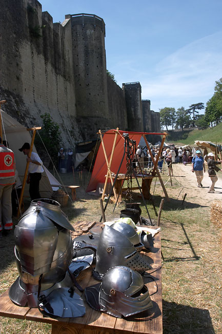 Helmets and armor before the walls